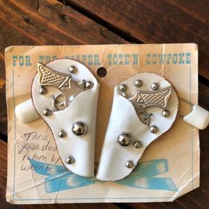 Stunning vintage gun holster diaper pins